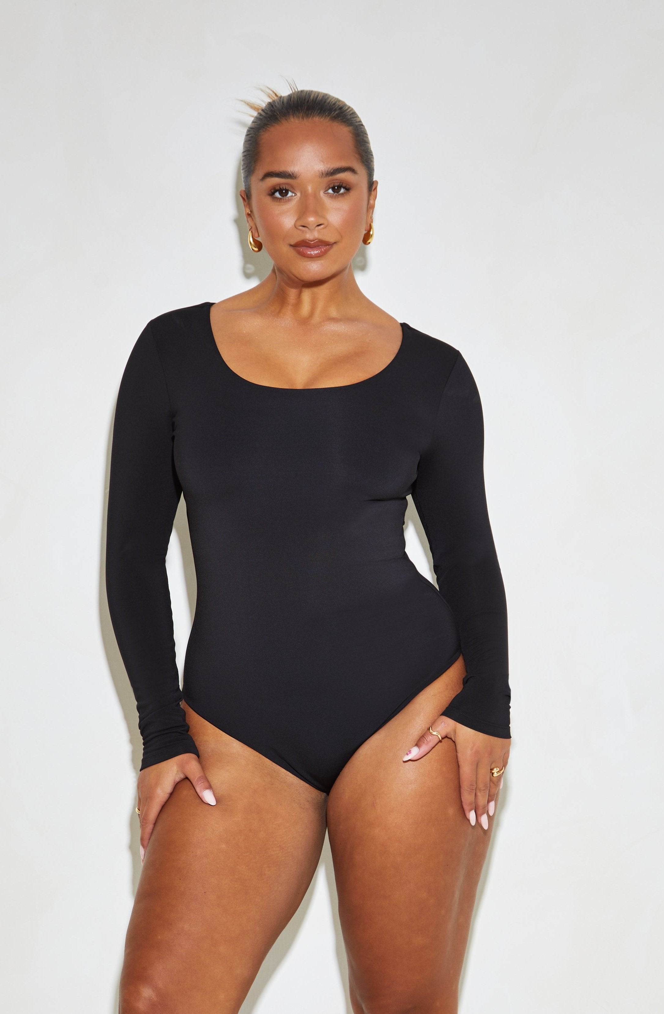 How To Style Your Black Long Sleeved Bodysuit This Spring