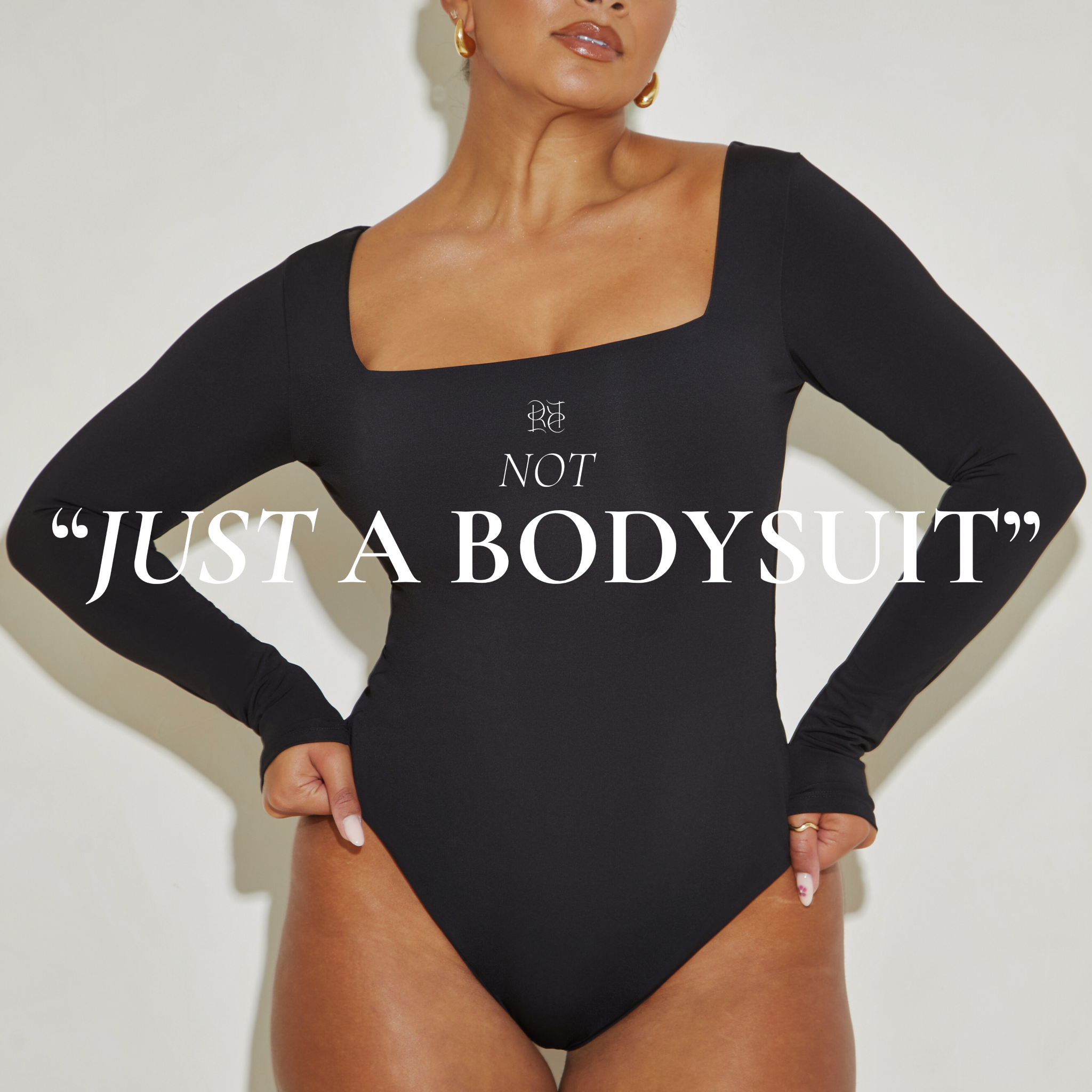 The Ultimate Capsule Wardrobe Essential: The Long-Sleeved Black Bodysuit